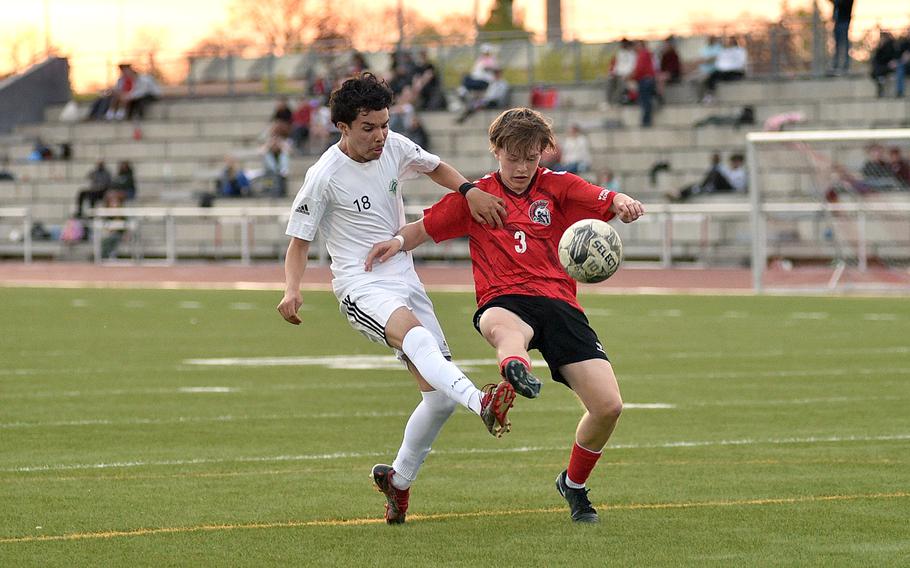 Jesus Lukas and Ethan Bellus battle for the ball.