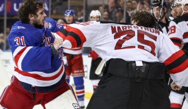 Igor Shesterkin fights Jacob Markstrom during Rangers-Devils game