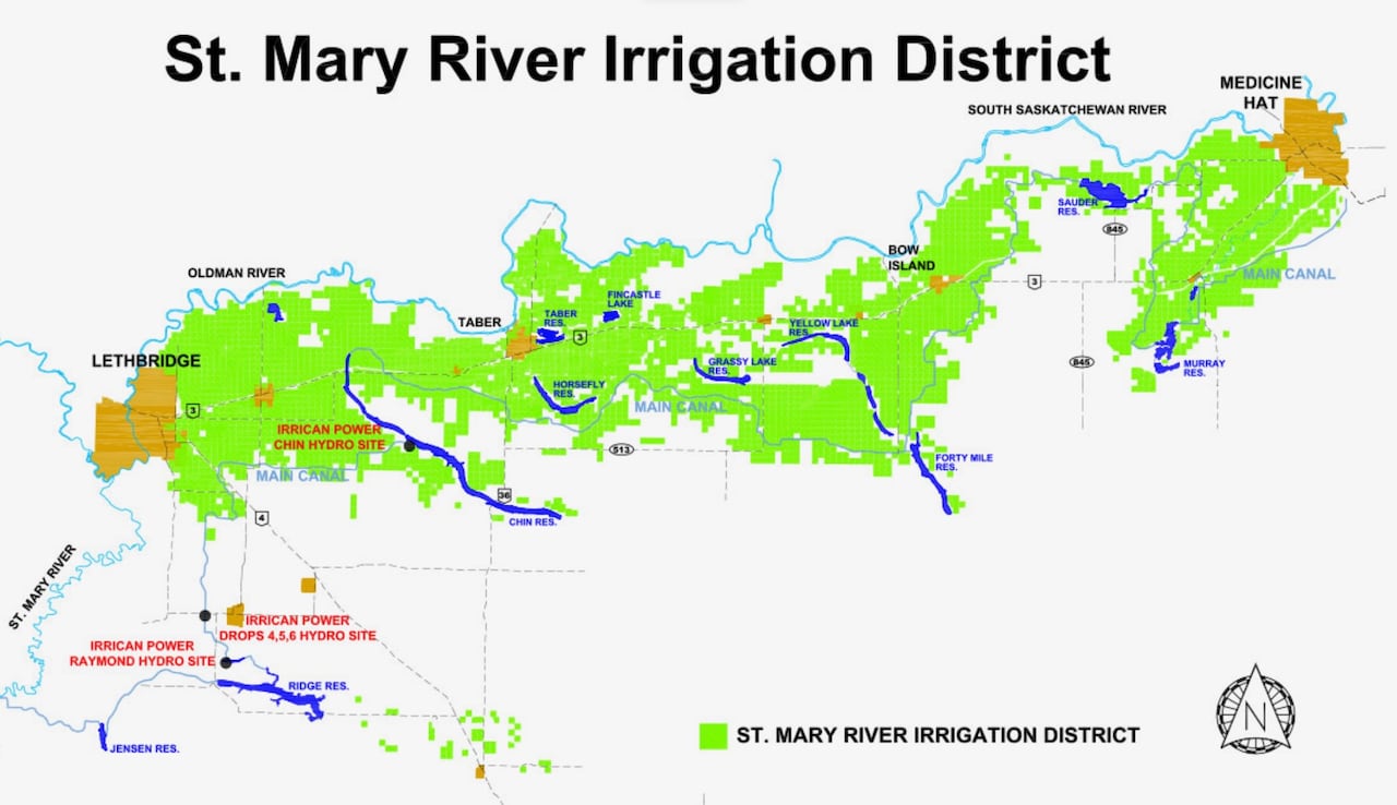 A map of southern Alberta features blue lines representing bodies of water and green sections, representing farmland serviced by an irrigation district.