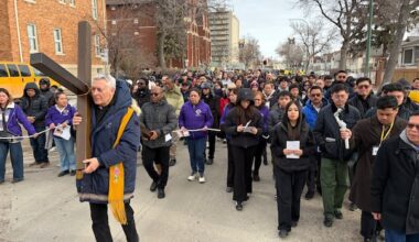 Winnipeg Catholics commemorate going through 'darkness to come to the light' in annual Way of the Cross walk