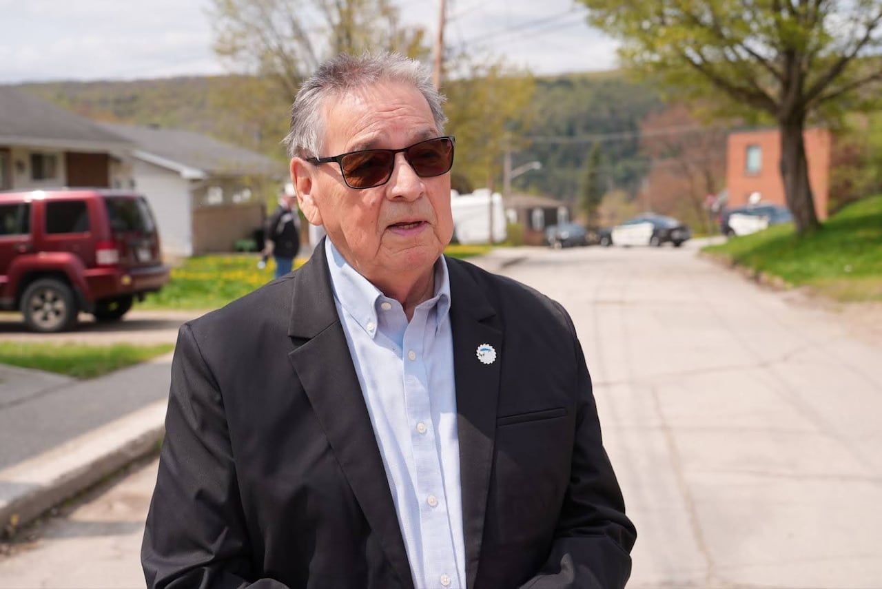 A man wearing sunglasses. 