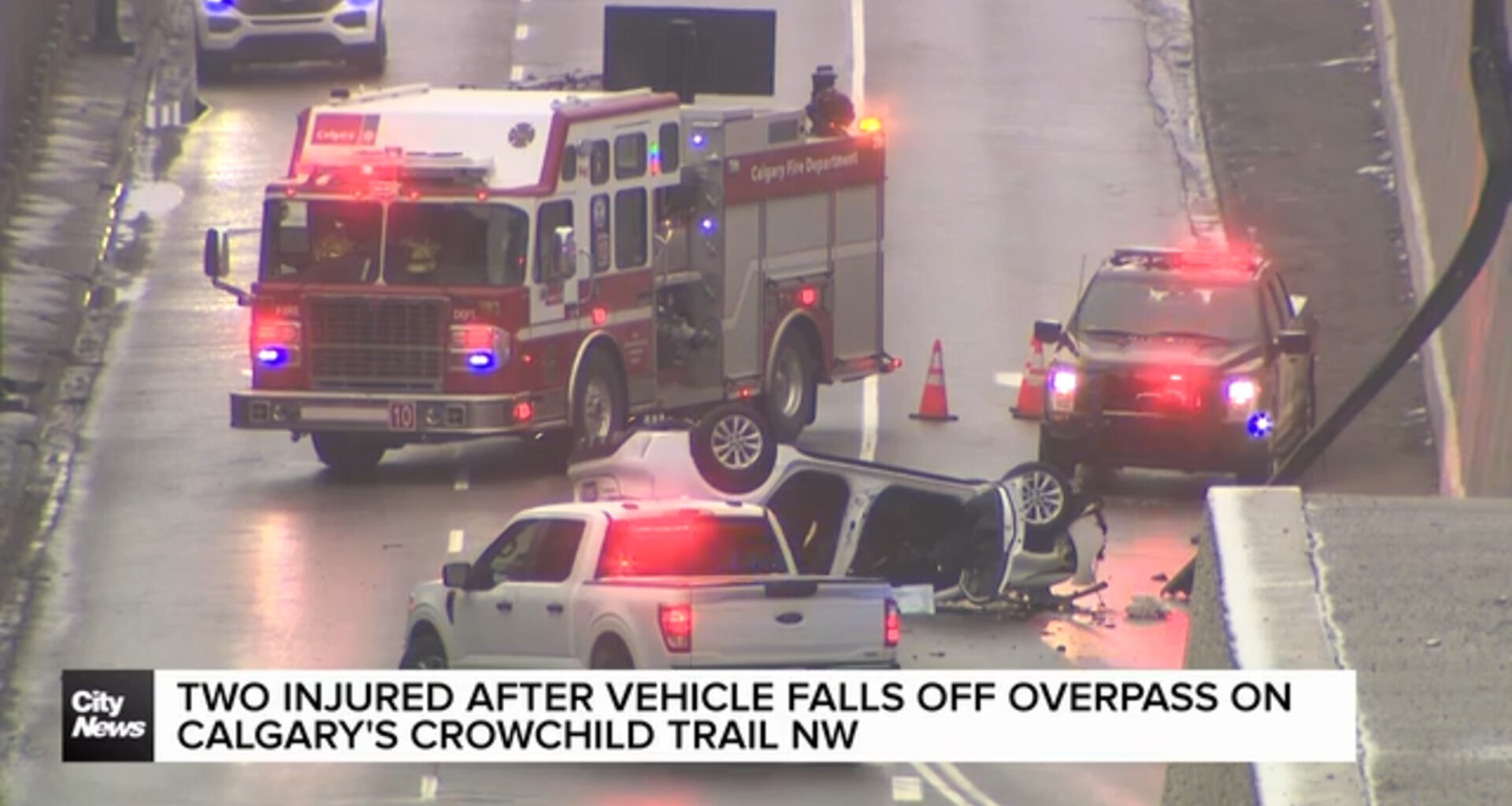 Two injured after vehicle falls off overpass on Calgary’s Crowchild Trail NW