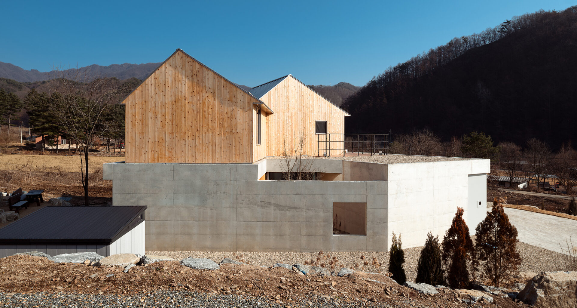 Two Gabled Volumes, One Landscape / BRBB Architects