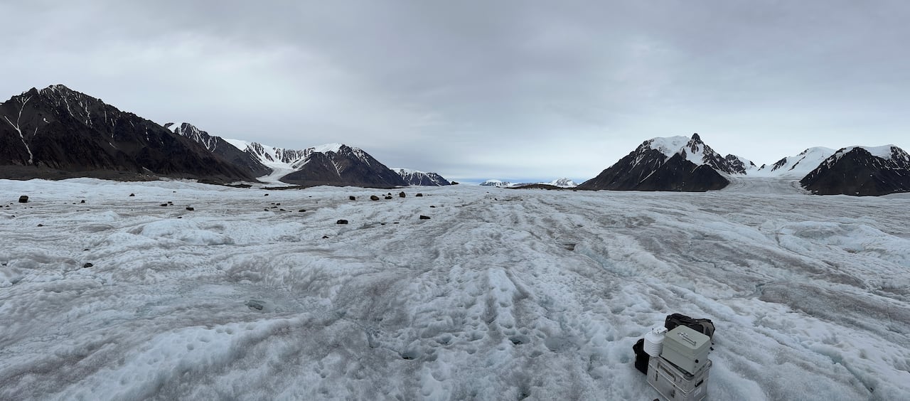 A University of Ottawa research teams sets up equipment at this glacier in the Canadian Arctic, which is the site of one of the subglacial lakes identified in a new study.