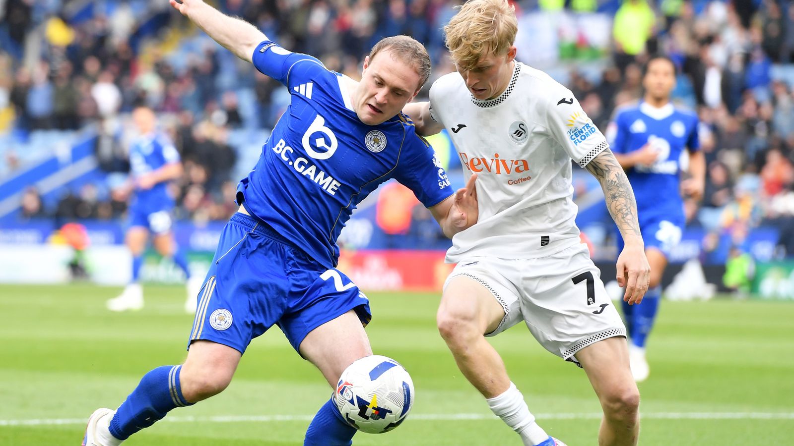 Oliver Skipp of Leicester City and Melker Widell of Swansea City in EFL Championship action