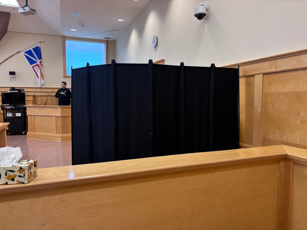 A black curtain in a courtroom.