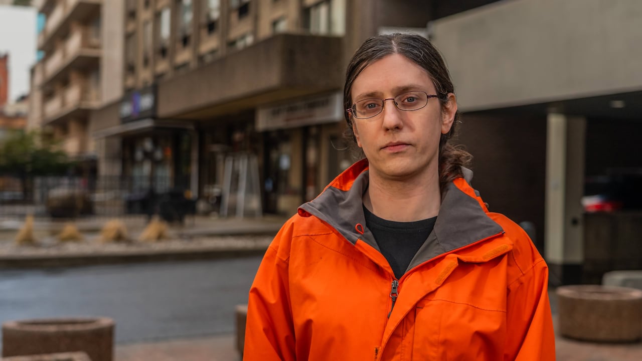 A woman outside in a coat