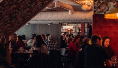 A restaurant filled with diners.