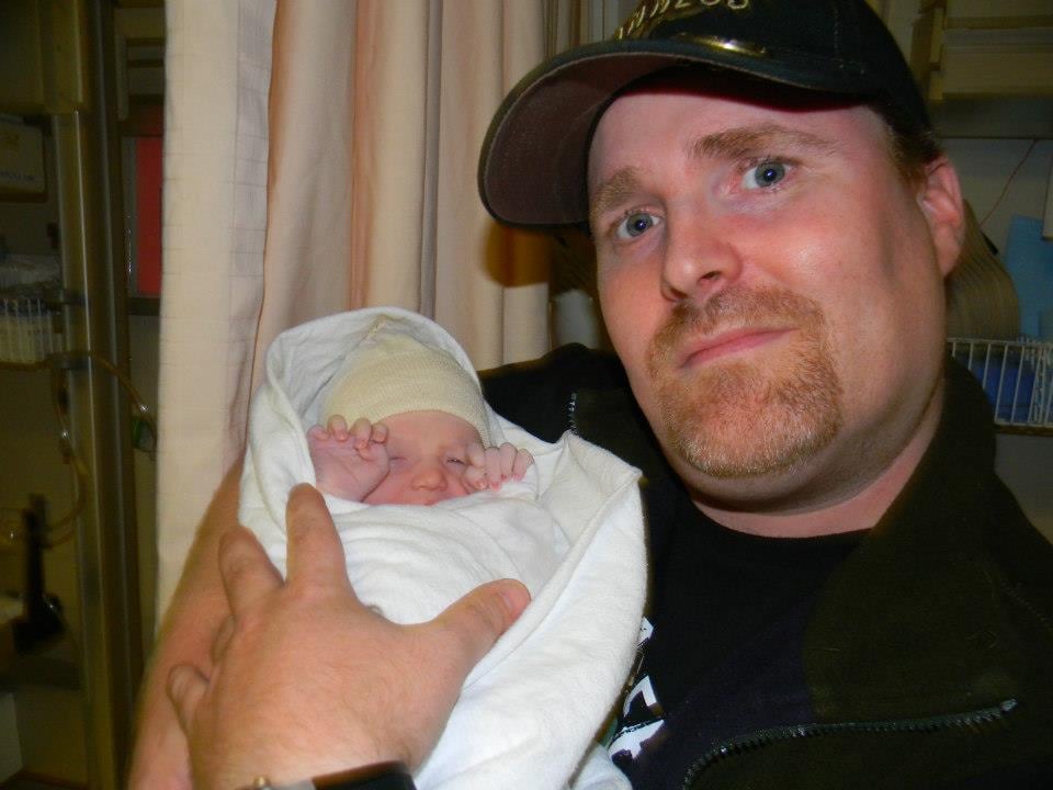 man holding baby