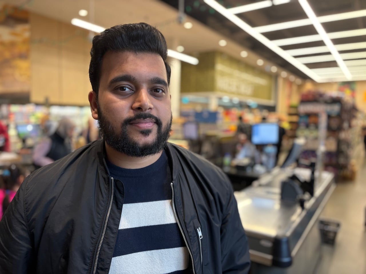 Omama Mukhtar, general manager of operations at Apna Farm grocery store, a business at the plaza,