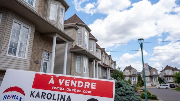 Canadian Real Estate Association downgrades housing market forecast due to 'oil shock'