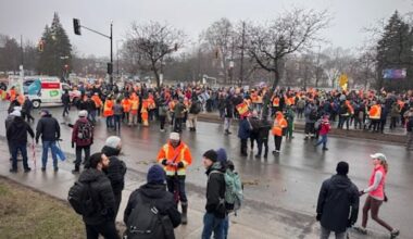 Striking Montreal blue-collar workers block part of Sherbrooke Street E. during rush hour
