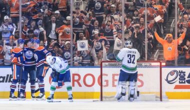 Oilers claim playoff home-ice advantage in 6-1 rout of Canucks