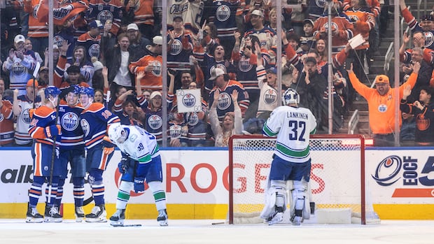 Oilers claim playoff home-ice advantage in 6-1 rout of Canucks