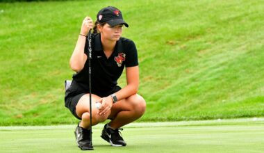 Jasmine Driscoll Pulling Club From Bag