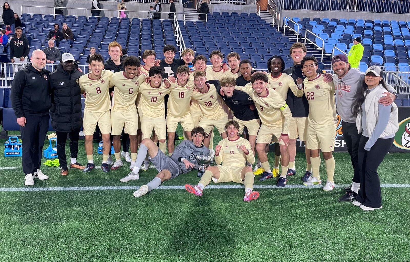 Men's Soccer celebrating goal against Northeastern