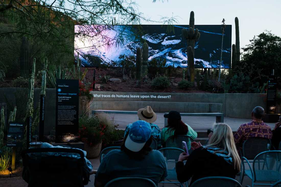 Visitors watch Horizon | Imprint from FRAMERATE: Desert Pulse on April 14, 2026 at Desert Botanical Garden in Phoenix, Arizona.