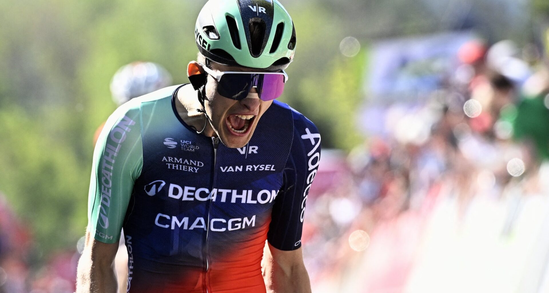 Decathlon CMA CGM Team's French Paul Seixas celebrates as he crosses the finish line to win 'La Fleche Wallonne' one day cycling race, 200 km from Herstal to Huy, on April 22, 2026. (Photo by ) / Belgium OUT
