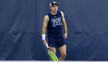 Eddie Biss forehand at net