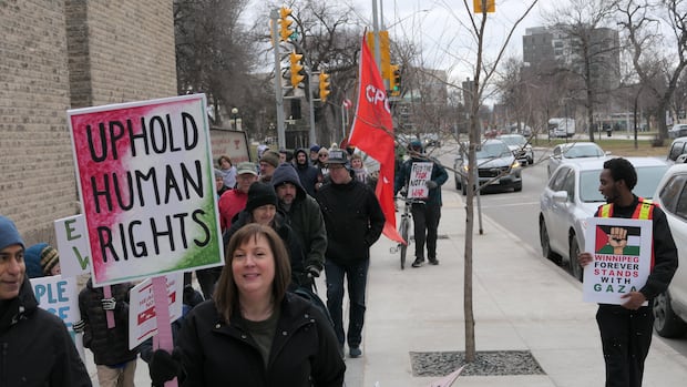 Winnipeggers rally against 'endless wars' in march through downtown
