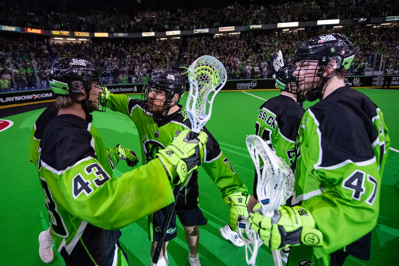 Four players of the Saskatchewan Rush