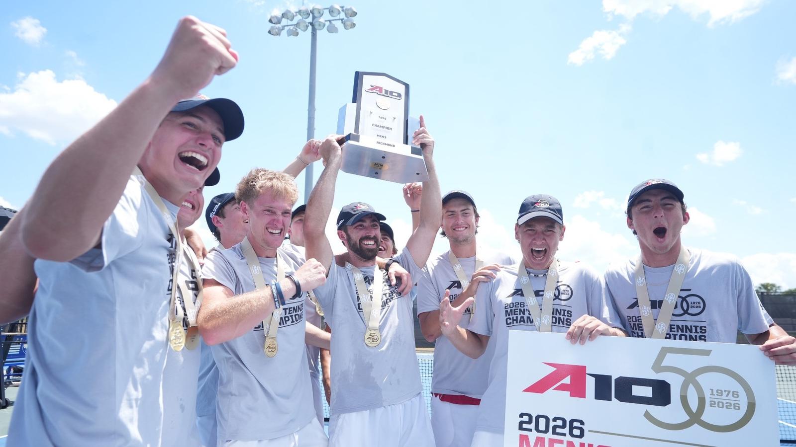 Photo of the men's tennis team and coaches after winning the title