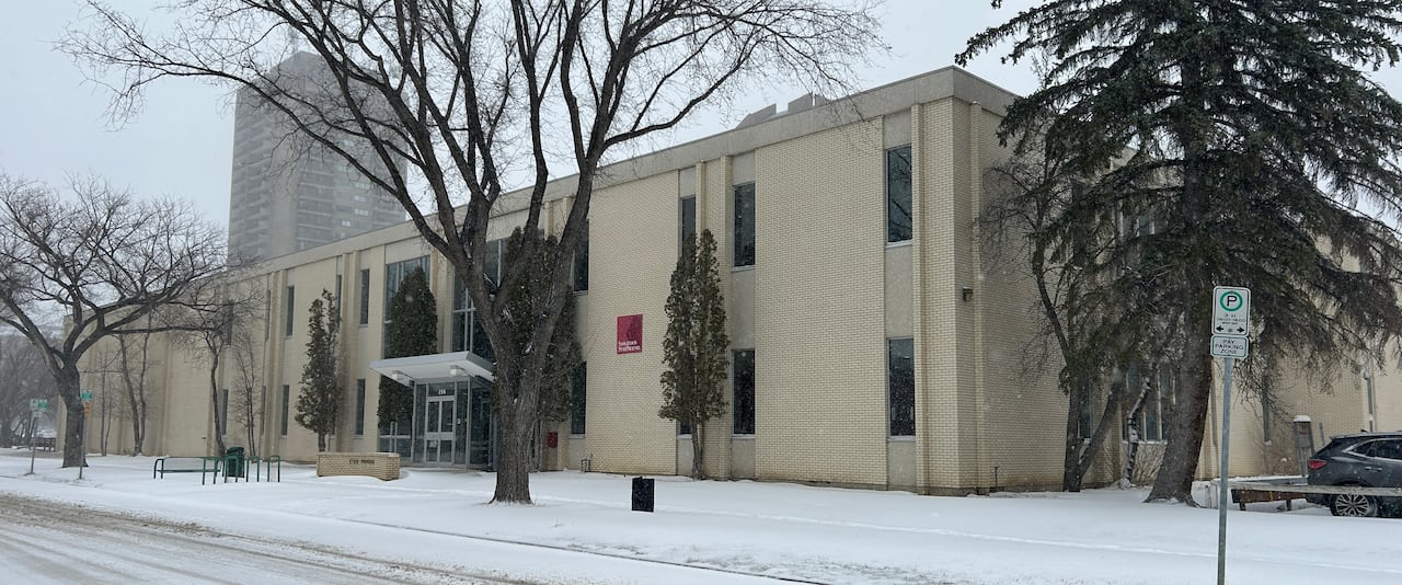 A two-storey building is seen in winter.