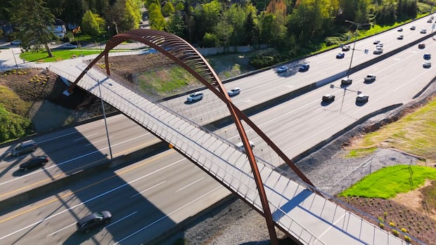 Cyclists, pedestrians now have a way over 'concrete river' of Highway 1 in Burnaby