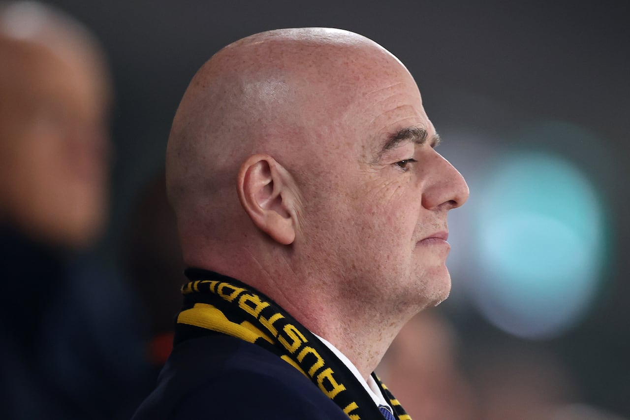 A man is seen looking on.