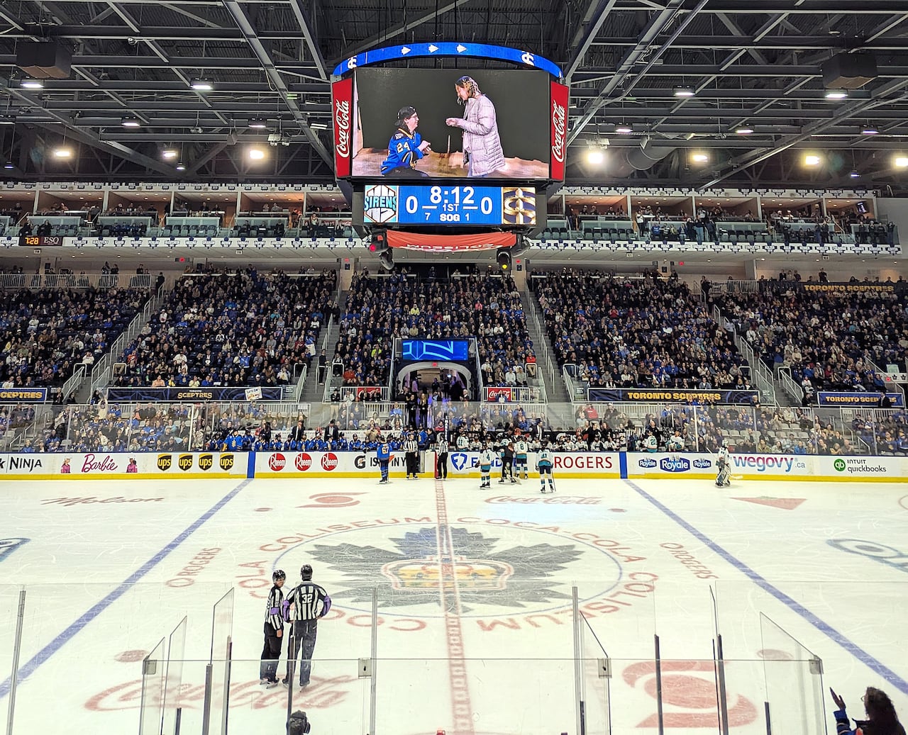 A hockey rink at ice level.