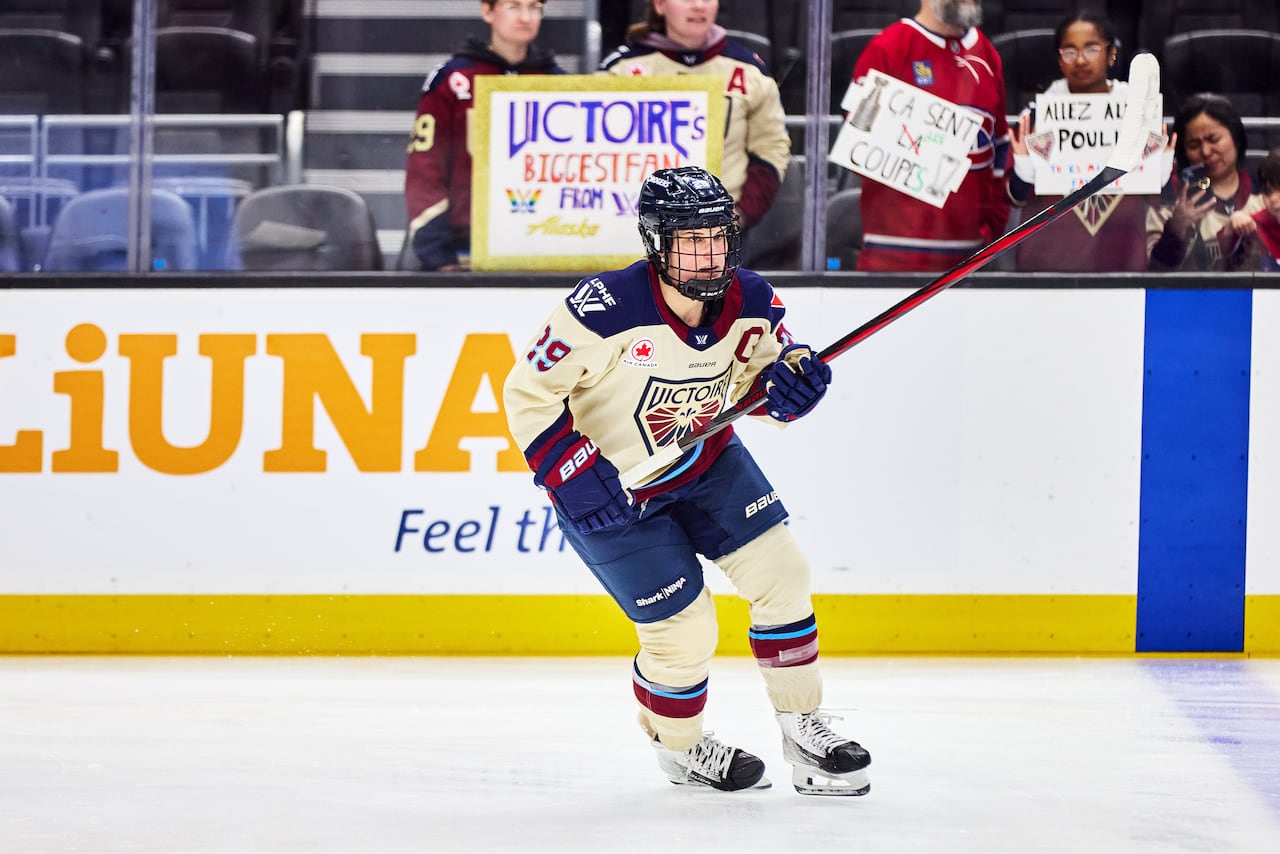 A hockey player skates during a game.