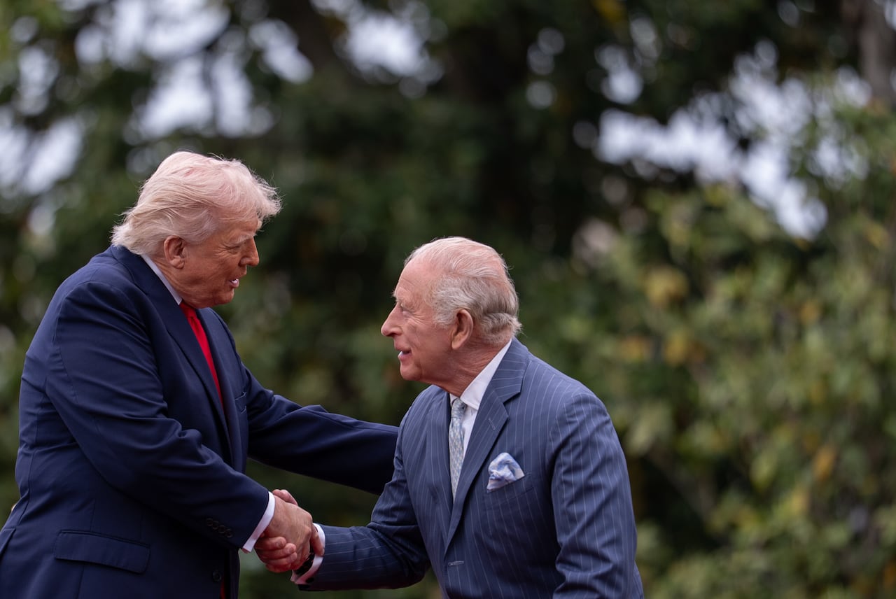 King Charles, right, President Donald Trump, left, shake hands during a State Visit arrival ceremony on the South Lawn of the White House, Tuesday, April 28, 2026, in Washington.