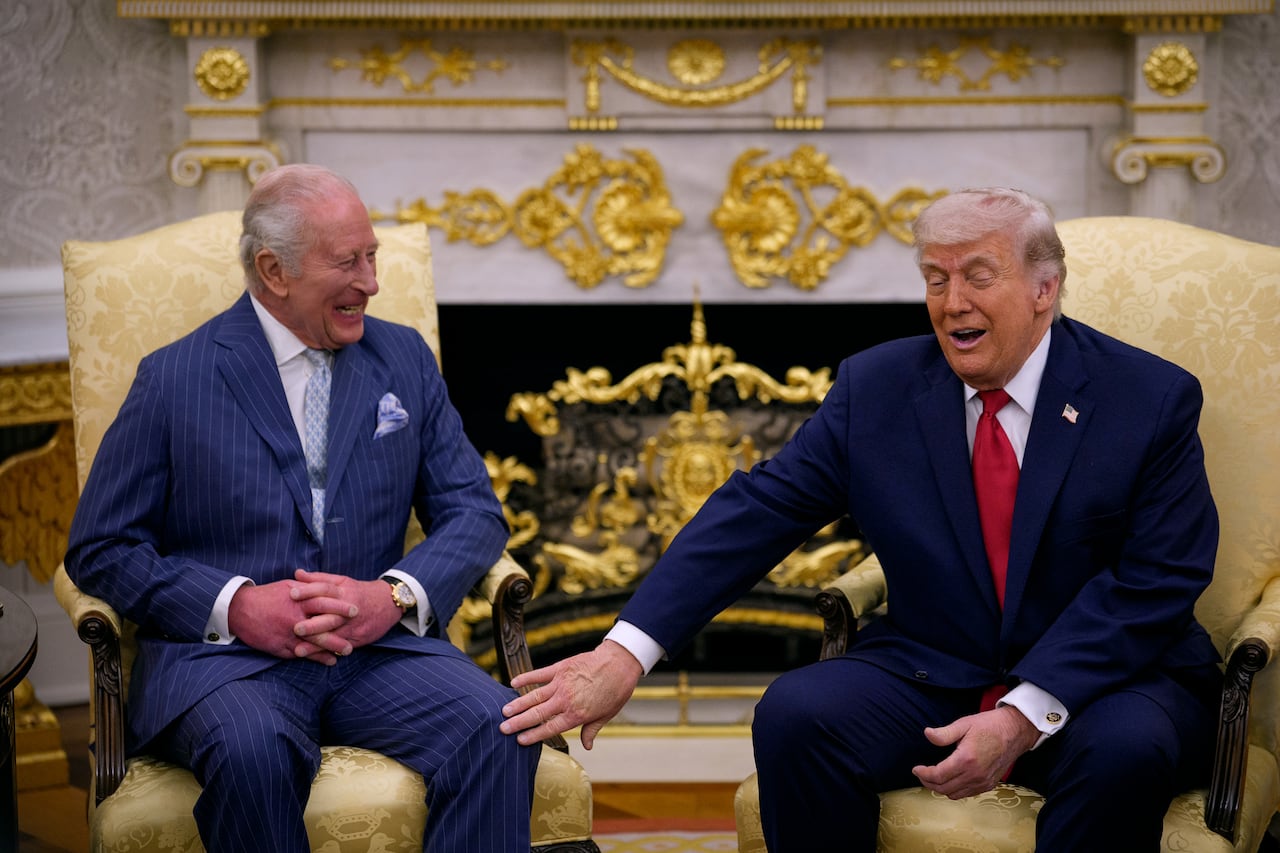 U.S. President Donald Trump touches King Charles during a meeting in the Oval Office of the White House on April 28, 2026 in Washington, DC.
