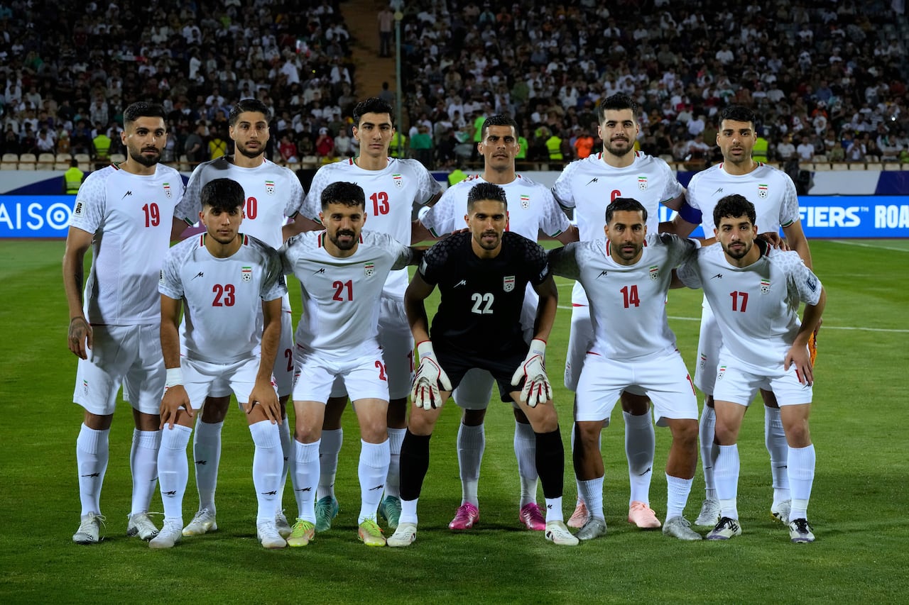 A soccer team poses for a photo