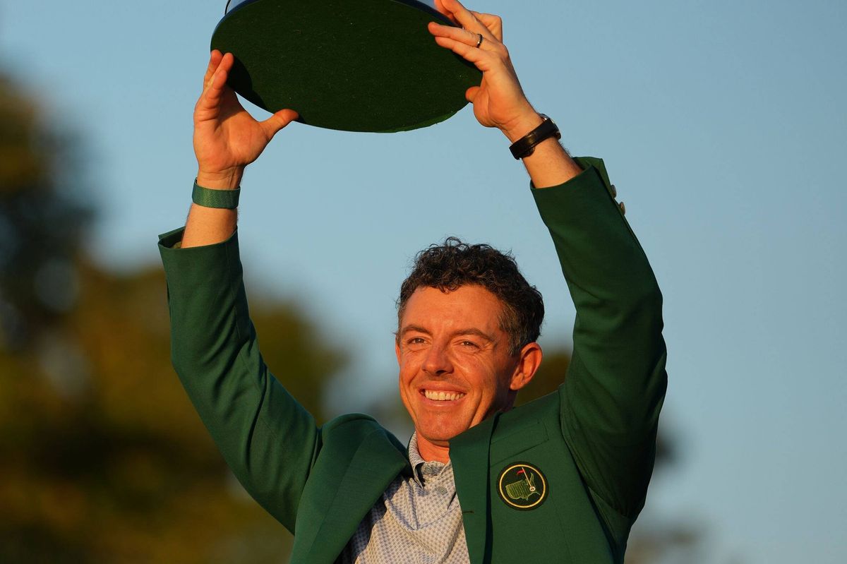 Rory McIlroy lifts the Masters trophy