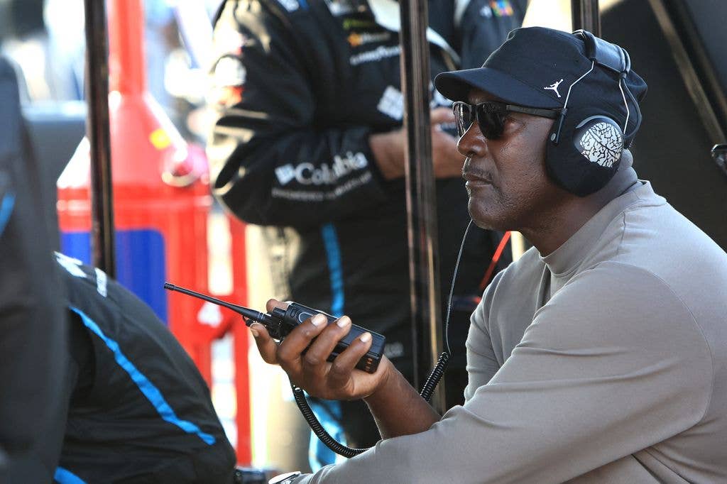 Michael Jordan watches the on track action from the pit box of Bubba Wallace (#23 23XI Racing Columbia Toyota) during the running of the NASCAR Cup Seies Goodyear 400 on March 22, 2026 at Darlington Raceway in Darlington S.C