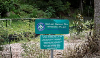 Sign warns people about a coal ash disposal site several miles from the University of North Carolina’s energy plant in Cha...