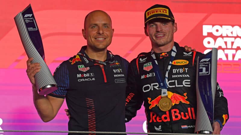 Max Verstappern and Gianpiero Lambiase (both Red Bull-Honda) on the podium after the 2023 Qatar Grand Prix