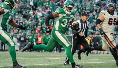 Saskatchewan Roughriders linebacker A.J. Allen returns an interception for a touchdown.