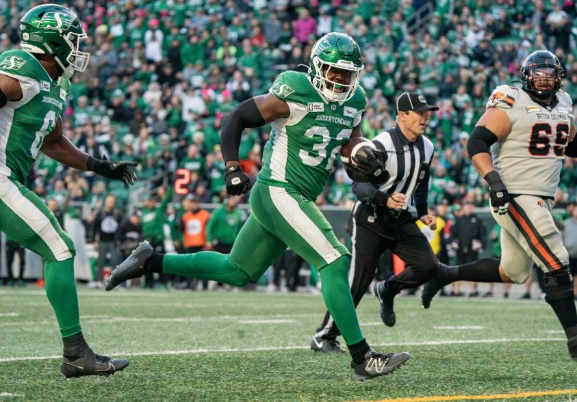 Saskatchewan Roughriders linebacker A.J. Allen returns an interception for a touchdown.