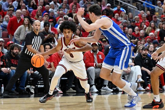 Mikel Brown Jr. dribbles the ball Andrija Jelavic
