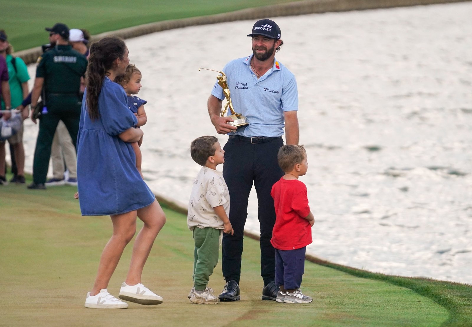 Cameron Young with wife Kesley and three children
