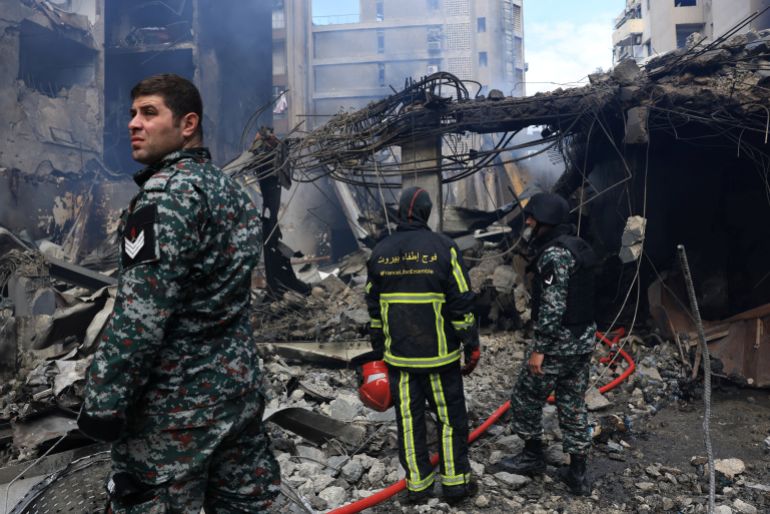 Rescuers stand at the site of an Israeli strike carried out on Wednesday, in Al-Mazraa in Beirut, Lebanon, April 9, 2026. REUTERS/Raghed Waked