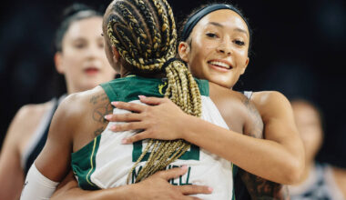 Aces guard Aaliyah Nye hugs former Aces guard Tiffany Mitchell during game one of a first round ...