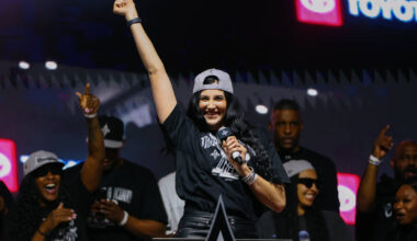 Aces center Megan Gustafson walks up to the podium to make some remarks during the Aces’ ...