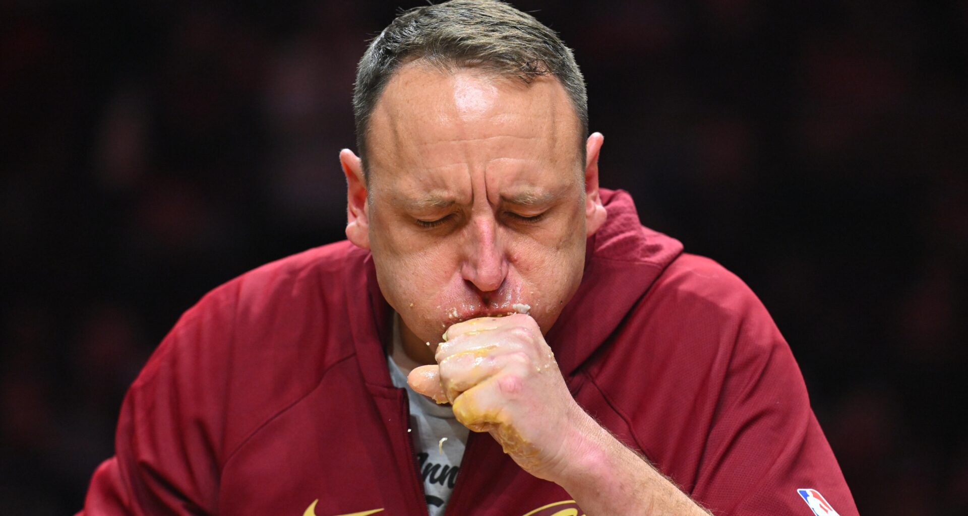 Joey Chestnut Sets World Record in Cake Eating Contest with NFL Players in Trending Video