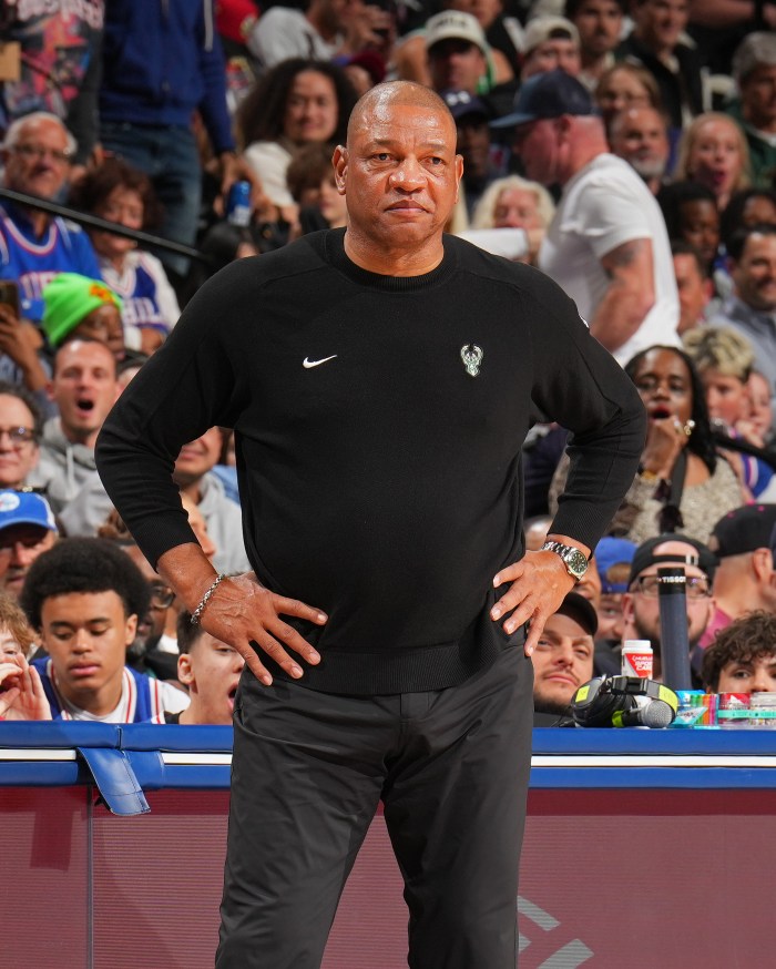 Doc Rivers coaches from the sidelines
