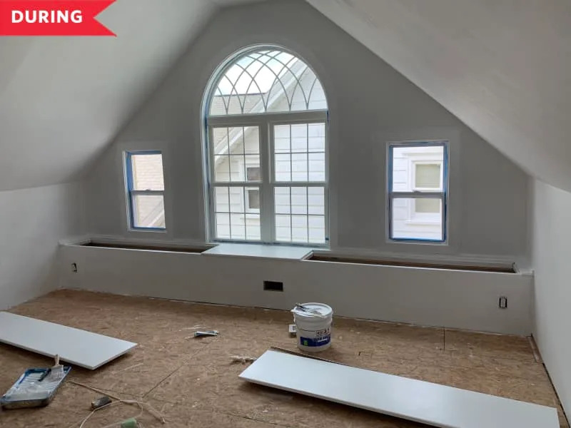 During: Attic with large window installed