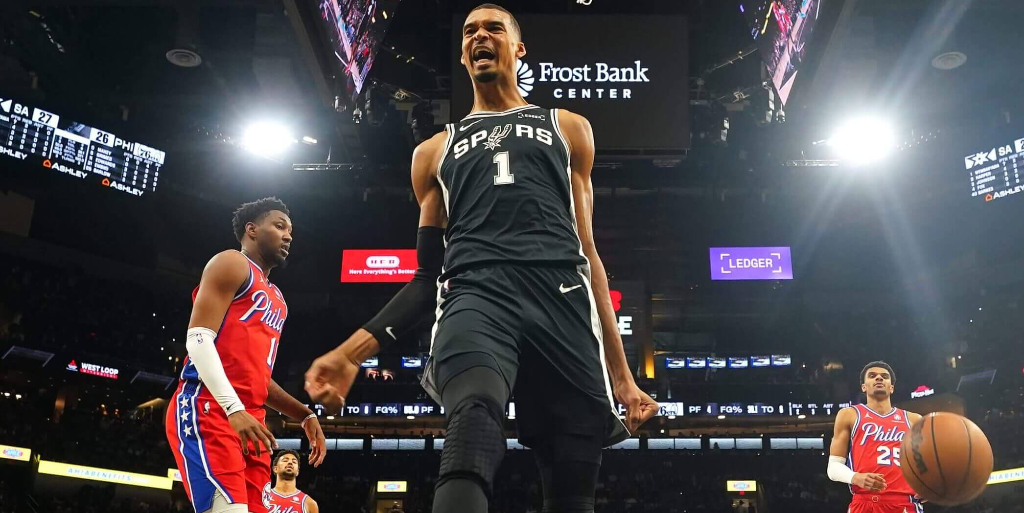 Victor Wembanyama celebrates after a good play.