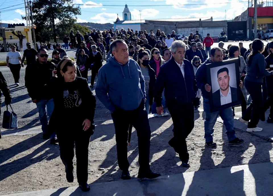 People participate in a funeral procession for Ignacio Salazar Flores, one of the miners kidnapped last month from a mine run by Canada’s Vizsla Silver Corp and whose body was later found in a clandestine grave in Concordia, Sinaloa, as mourners head towards the cemetery, in Sombrerete, Zacatecas state, Mexico, February 10, 2026.